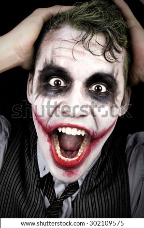 Dark creepy joker face screaming angry