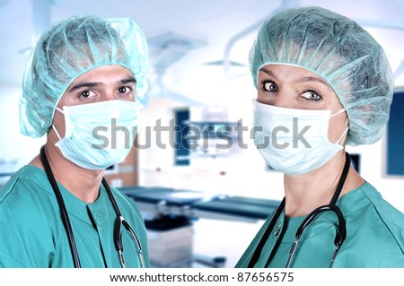 male and female surgeons in the operating room