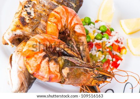 Giant prawns with sea bass fish.
