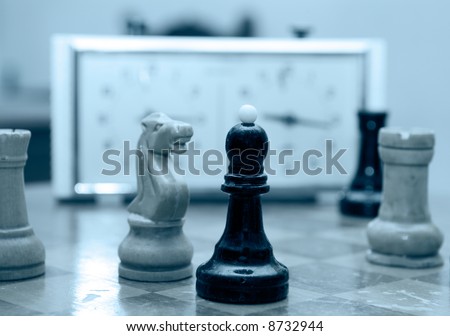 Chessmen on a table during game time.