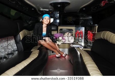 beautiful woman in a limousine