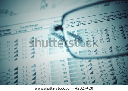 financial figures and pen