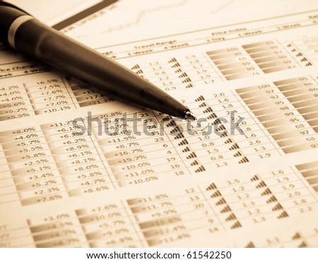 financial figures and pen