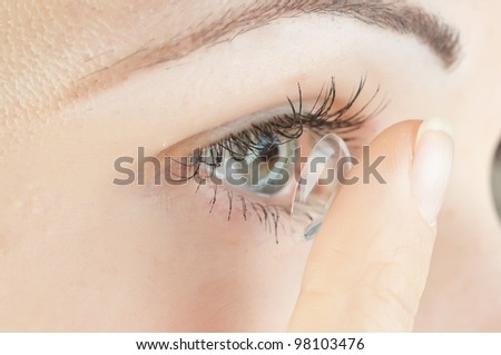 beautiful human eye and contact lens