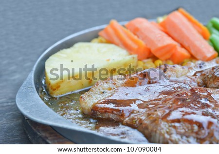 close-up sirloin beef steak  and vegetable