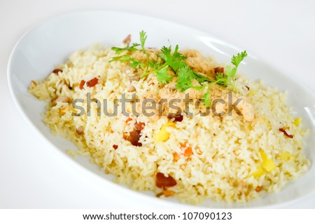 fired rice and  dried shredded pork  on white plate
