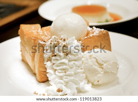 toast with ice cream and  whipping cream