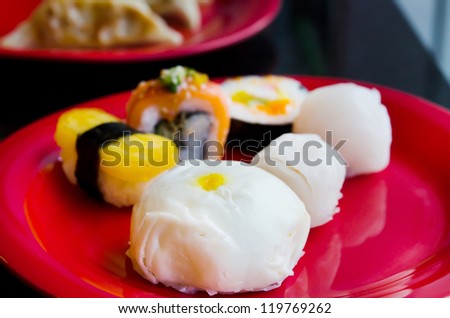 japanese cuisine  on a  plate, pork bun and mix sushi