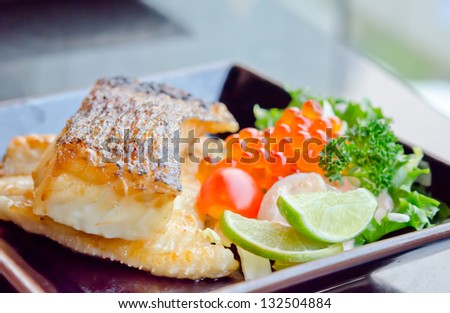Japanese grilled cod fish and fresh salad with fish egg