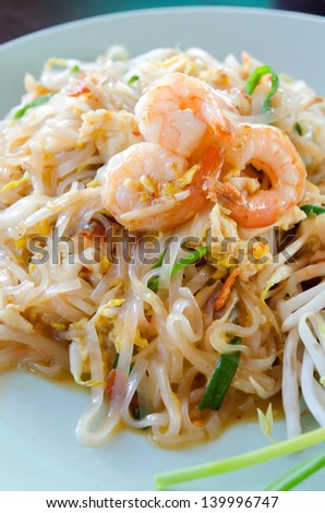 Stir fried  noodles with shrimp , egg  and fresh vegetable , asian style food