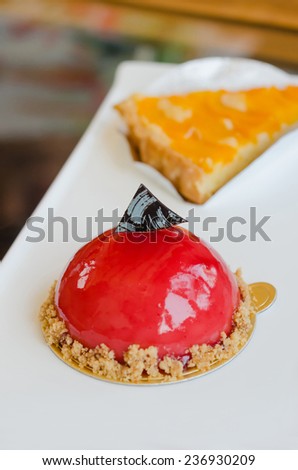 Raspberry yogurt mousse  , sweet red dessert on plate