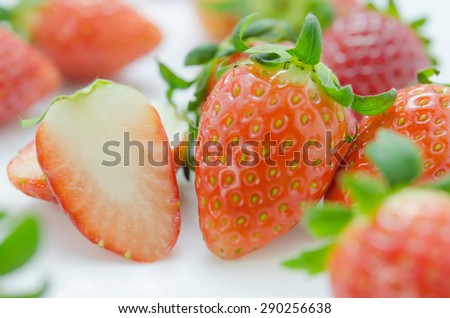 close up of fresh strawberries , red fruits