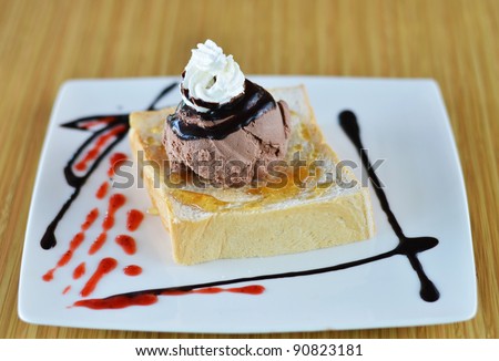Honey toast  and whipping cream with chocolate ice cream