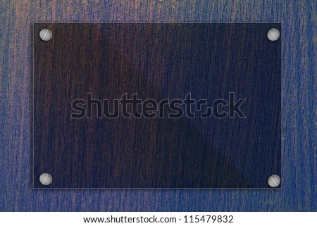 Glass frame on old wooden wall.