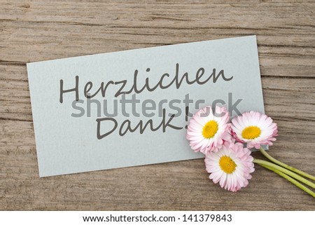 card with lettering thanks and daisies/thanks/daisies