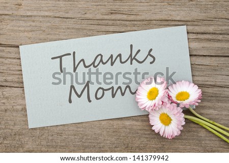 card with lettering thanks mom and daisies/thanks/daisies