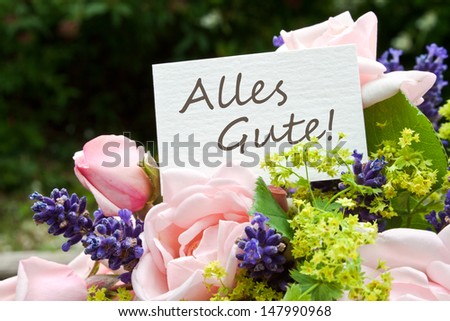 pink roses, lavender and card with lettering all the best/all the best/flowers