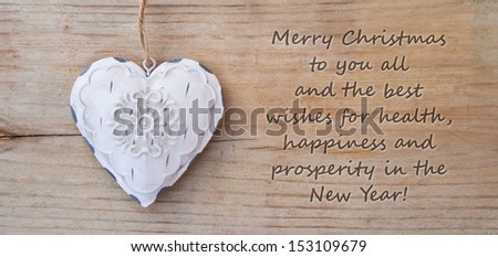 christmas card with white heart/Merry Christmas and a happy new year/english