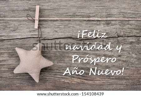 christmas card with star/Merry Christmas and a happy New Year/spanish