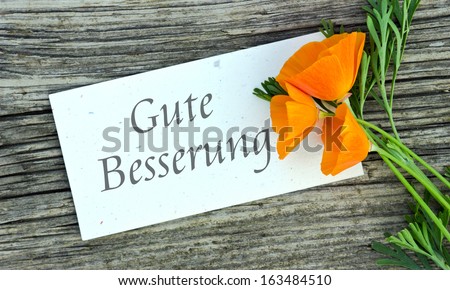 white card with poppy/Get well/german