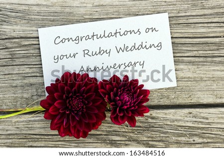 Ruby wedding anniversary card with red flowers/congratulation on your ruby wedding anniversary/english