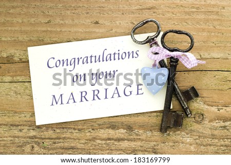 Wedding Card with two keys and heart/congratulations on your marriage/english