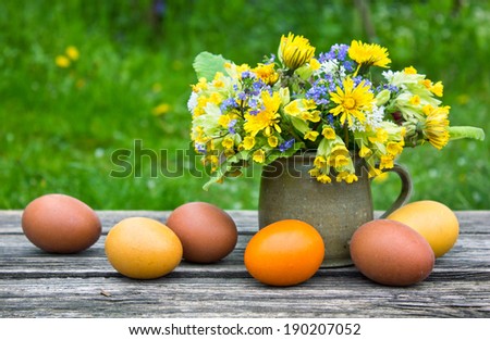 Bouquet with spring flowers and easter eggs/easter/flowers