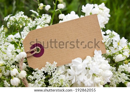 Lily of the valley, lilac and label/flowers/May