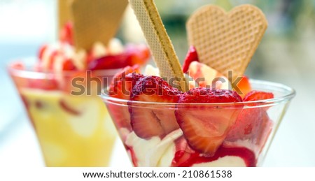 Ice cream with strawberries and waffles/ice cream/sundae