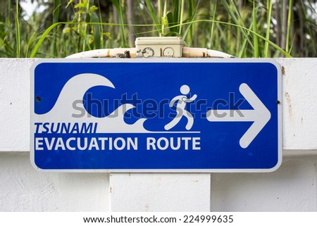 Sign for tsunami evacuation route/escape route/tsunami