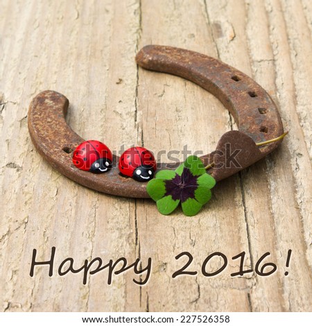 New Years Card with horseshoe, Leafed clover and ladybugs/Happy 2016/english