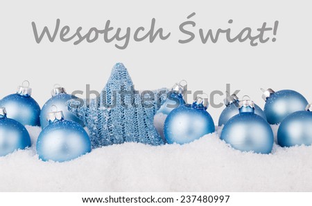 polish Christmas card with blue christmas balls and text merry christmas/merry christmas/polish