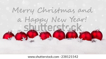 english Christmas card with red christmas tree balls and text Merry Christmas and a happy New Year/Merry Christmas and a happy New Year/english