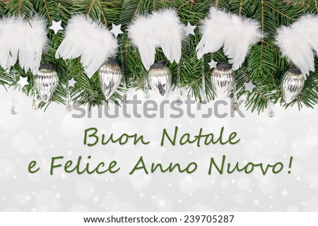 italy Christmas card with Pine green, baubles, angel wings and text Merry Christmas and a happy New Year/Merry Christmas and a happy New Year/italy