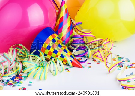 Balloons, streamers, confetti and party hats/party/carnival