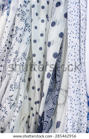 various blue and white fabrics in a row / blue and white fabrics / fabric samples
