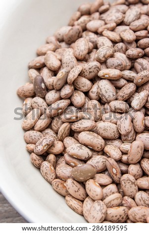Plate of dried pinto beans / pinto beans / legumes