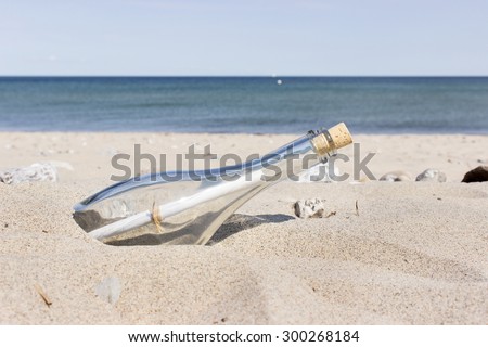 Message in a Bottle on the sandy beach / Message in a Bottle / beach