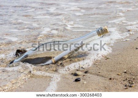 Message in a Bottle in the surf /Message in a Bottle / beach
