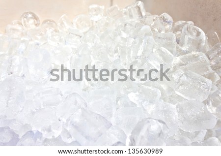 close up of many ice cubes in the box