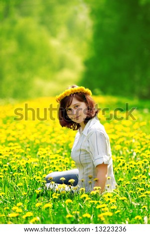 portrait of beautiful girl in flower diadem