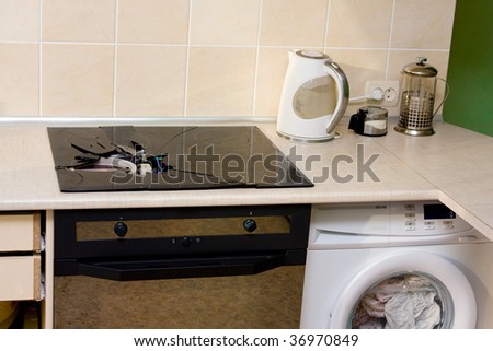 photo of broken stove in the kitchen