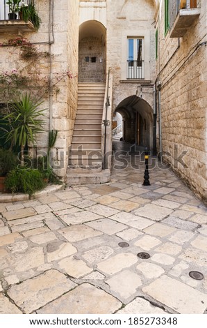 A typical street in the old town of Giovinazzo an ancient fishing village that overlooks the Adriatic Sea. Apulia - Italy