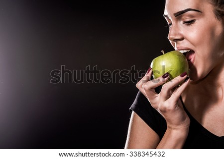 Sports Woman Eating Apple