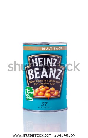 HARTLEPOOL, ENGLAND - NOVEMBER 30, 2014: A Tin of Heinz Baked Beanz Isolated on a White Background.  H.J. Heinz Company Sell Their Food Products in over 200 Countries Worldwide.