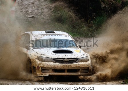  - stock-photo-salou-spain-nov-italian-driver-lorenzo-bertelli-and-his-codriver-lorenzo-granai-in-a-subaru-124918511