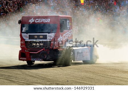 MADRID, SPAIN - OCT 10 : Spanish driver Antonio Albacete in a MAN Truck races in the XXIV GP of Spain during the the 2011 FIA Truck Racing season, on Oct 10, 2011 in Madrid, Spain.