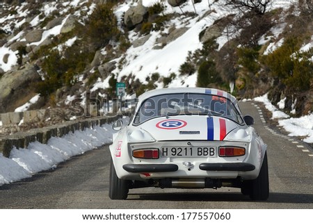 AVILA, SPAIN - MAR 1: Spanish driver Carlos De Miguel and his codriver Javier Arias in a Renault Alpine A110 races in the V Historic Rally of Spain , on Mar 1, 2013 in Avila, Spain.