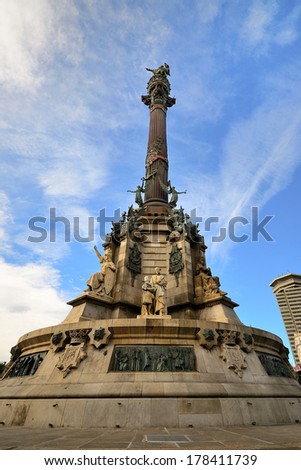 BARCELONA, SPAIN - FEB 1: The Columbus Monument is a 60 m tall monument at the lower end of La Rambla, constructed  in honor to Columbus first voyage to the Americas, on February 1, 2013. Barcelona