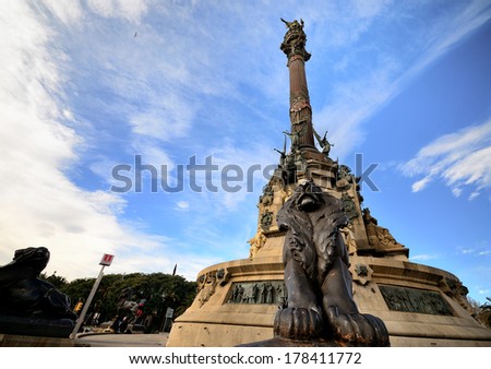 BARCELONA, SPAIN - FEB 1: The Columbus Monument is a 60 m tall monument at the lower end of La Rambla, constructed  in honor to Columbus first voyage to the Americas, on February 1, 2013. Barcelona
